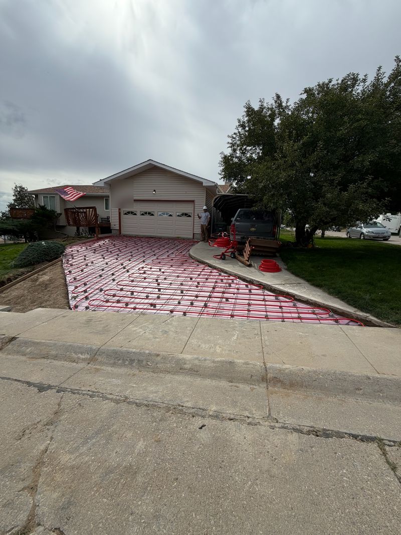 Radiant heating tubing laid out for a heated driveway in Gillette, WY